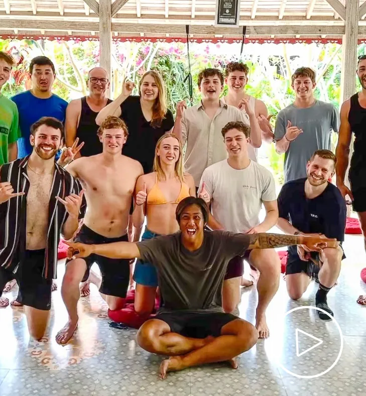 Surf coach Jerry with a group of Padang Padang Surf Camp guests