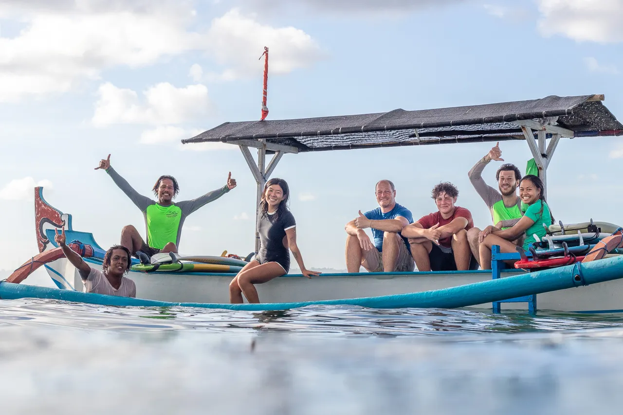 Guests travelling by boat for a Bali surf session