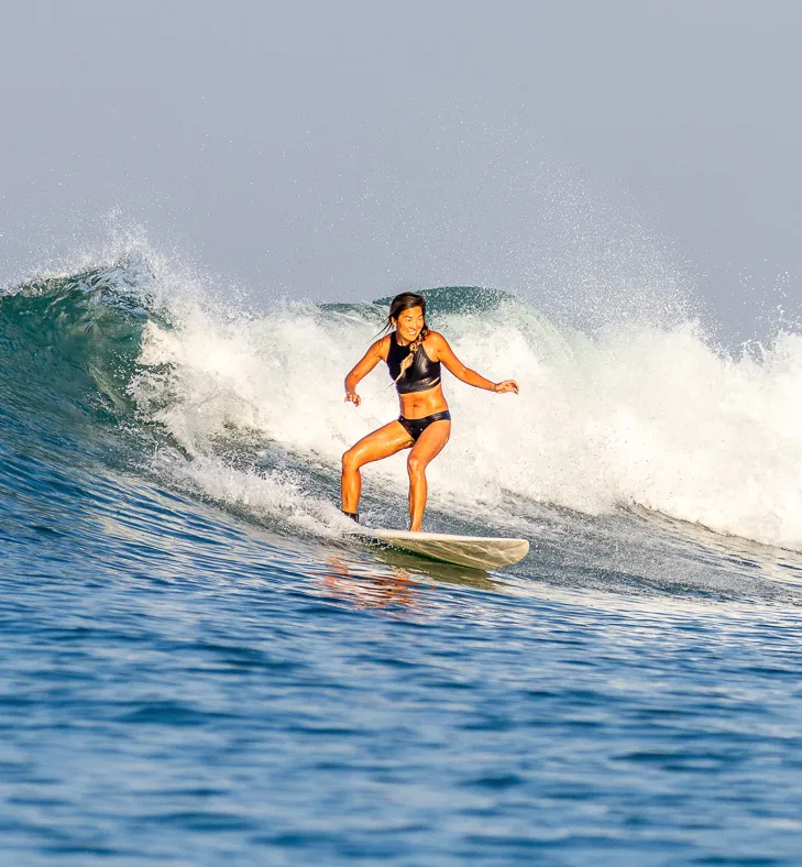 Guest smiling at Padang Padang Surf Camp